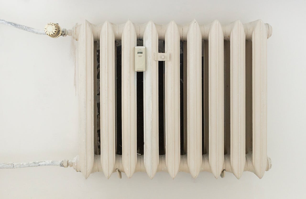 Services 2 white steel rib radiator in a new bright renovated room in apartment or home 12034871